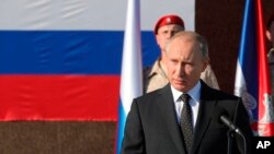 Президент России Владимир Путин на российской авиабазе Хмеймим в Сирии. 11 декабря 2017 г.